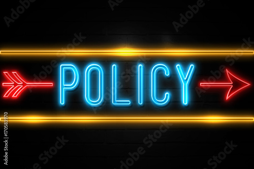 Policy - fluorescent Neon Sign on brickwall Front view