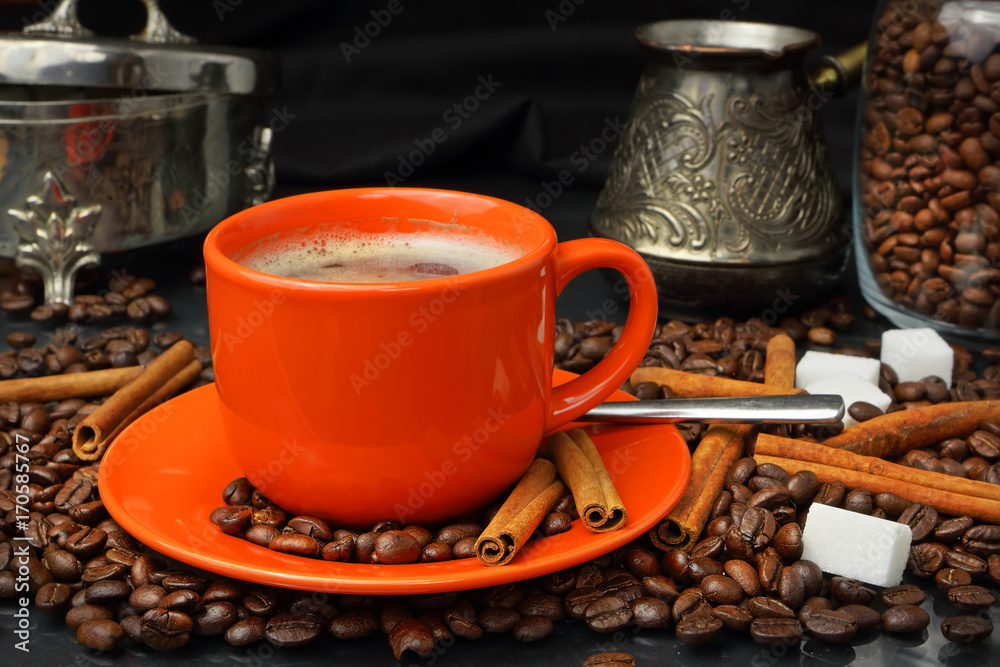 Coffee still life with an orange mug and a sugar bowl Coffee still life with an orange mug and a sugar bowl