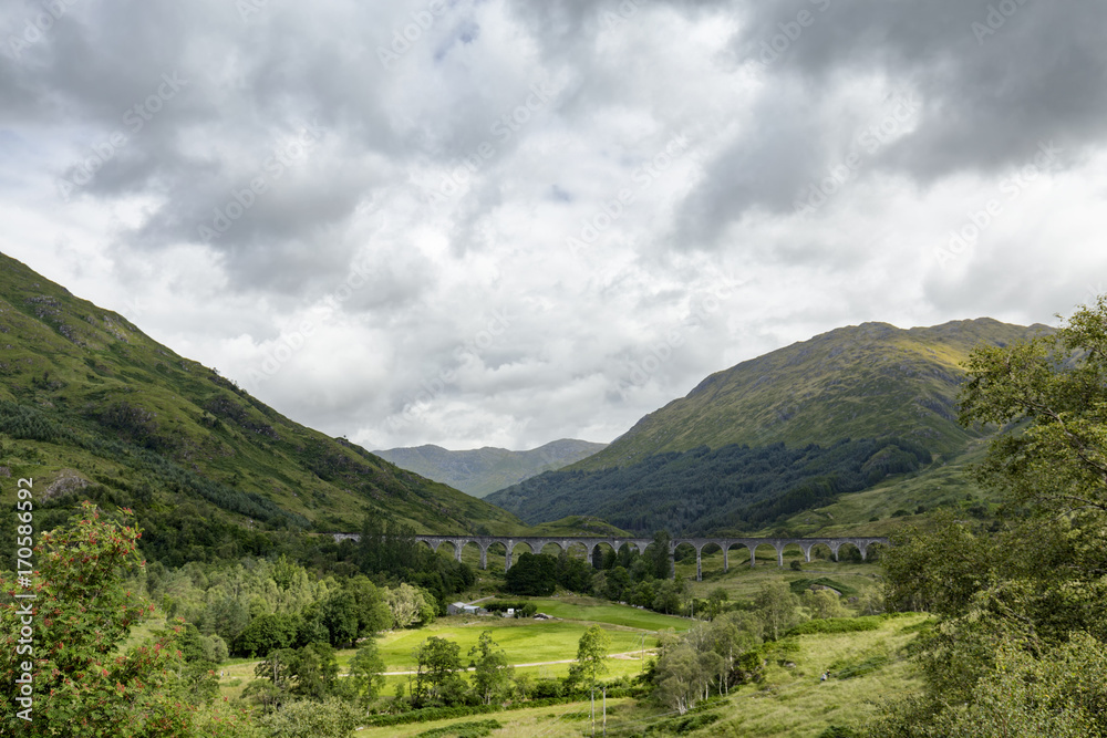 The world famous Glenfinnan viaduct on a cloudy summer morning in Scotland.