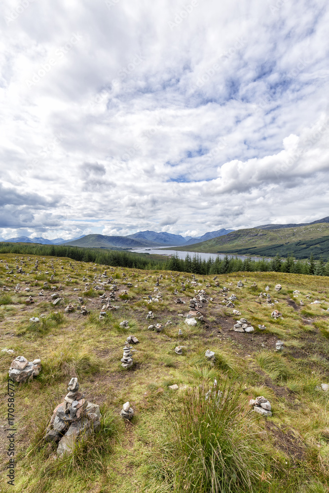 Fototapeta premium Small Cairns on the roadside near Loch Loyne, Scotland.