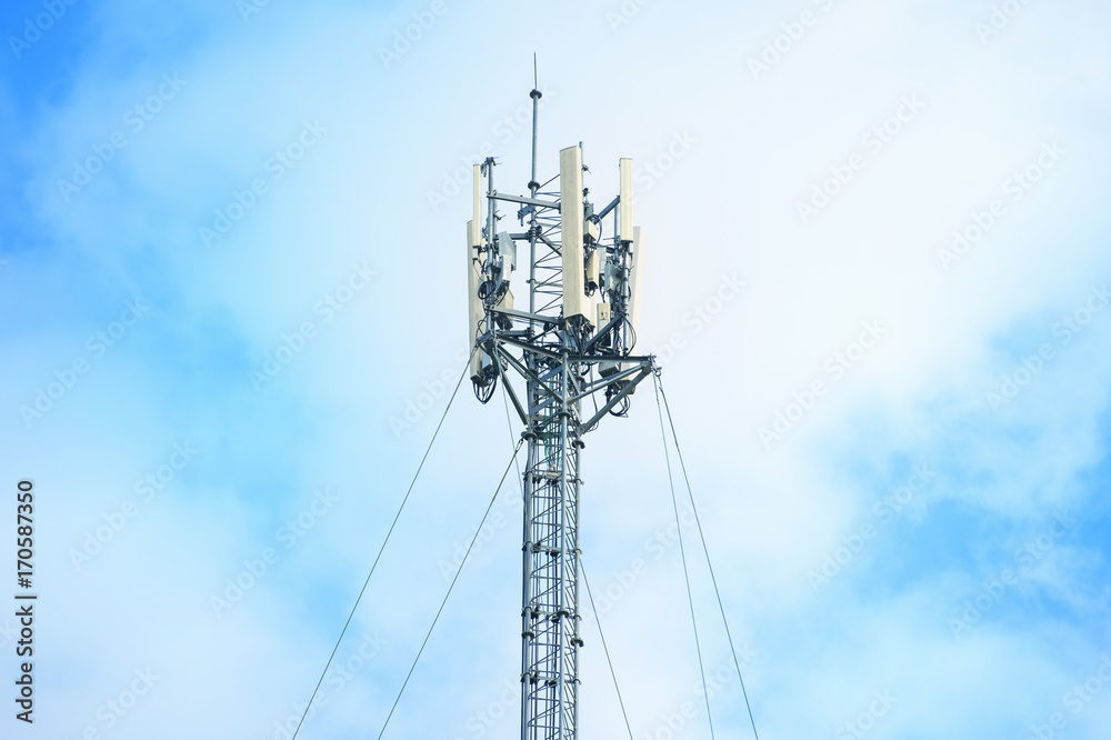 Telecommunication tower against the blue sky Telecommunication tower against the blue sky
