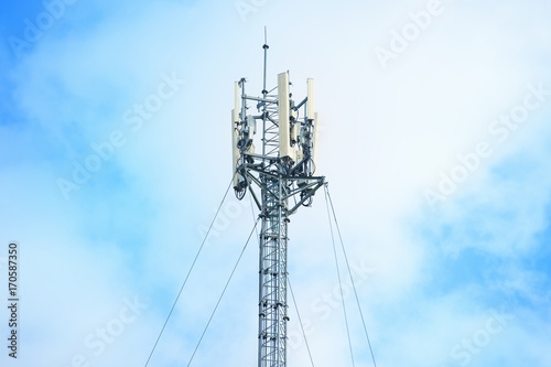 Telecommunication tower against the blue sky