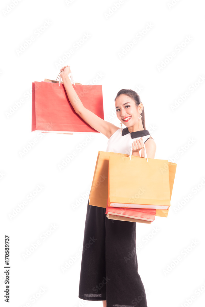 Cheerful shopping woman of Asian holding bags. Shopping smart business woman happy smiling holding colorful shopping bags isolated on white . Fresh young Asian female model Cheerful shopping woman of Asian holding bags. Shopping smart business woman happy smiling holding colorful shopping bags isolated on white . Fresh young Asian female model