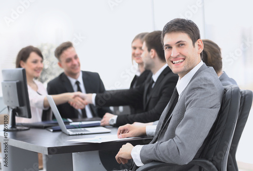 lawyer on the background of business partners handshaking