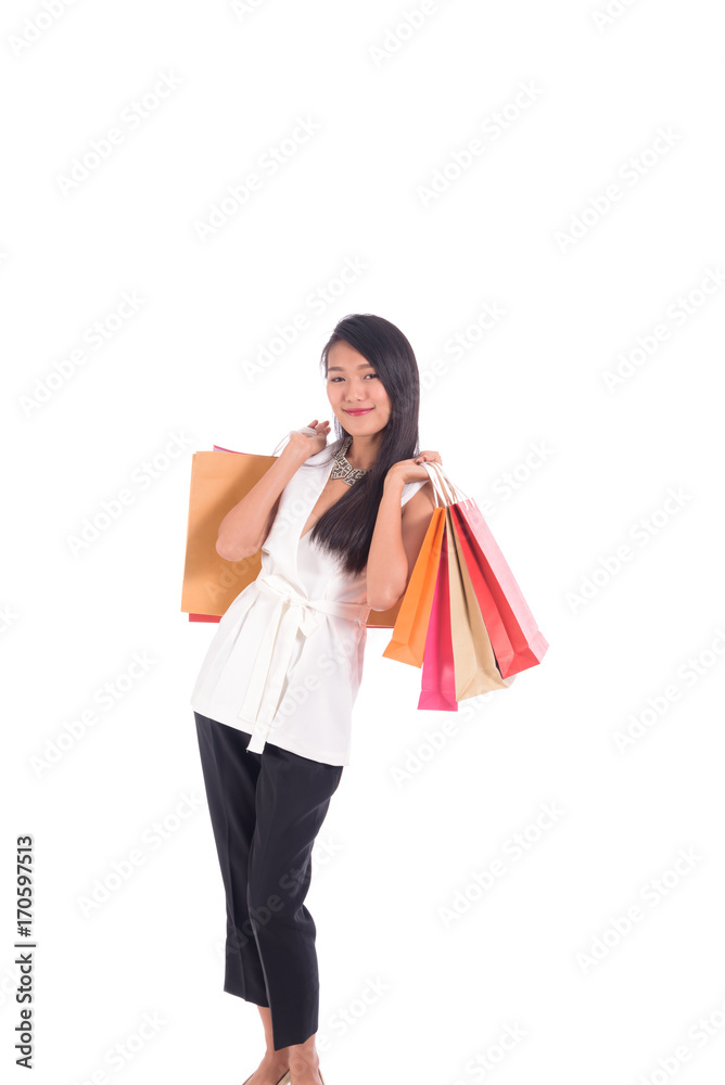 Cheerful shopping woman of Asian holding bags. Shopping smart business woman happy smiling holding colorful shopping bags isolated on white . Fresh young Asian female model Cheerful shopping woman of Asian holding bags. Shopping smart business woman happy smiling holding colorful shopping bags isolated on white . Fresh young Asian female model