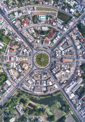 Aerial view, Road roundabout, Expressway with car lots in the city in Thailand. beautiful Street , downtown, cityscape, Top view. Background