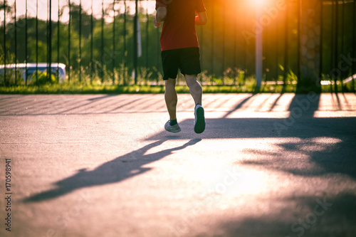 Athlete sport runner man running or jogging to exercise in morning time