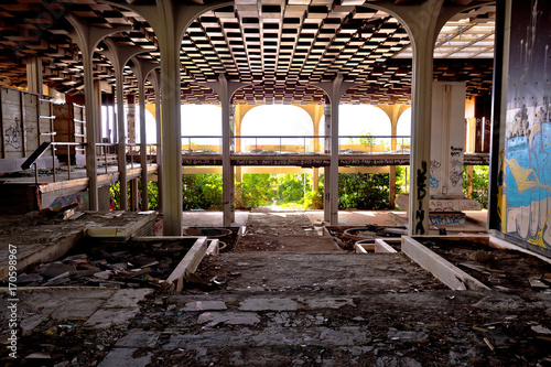 Abandoned and destructed luxury hotel interior photo