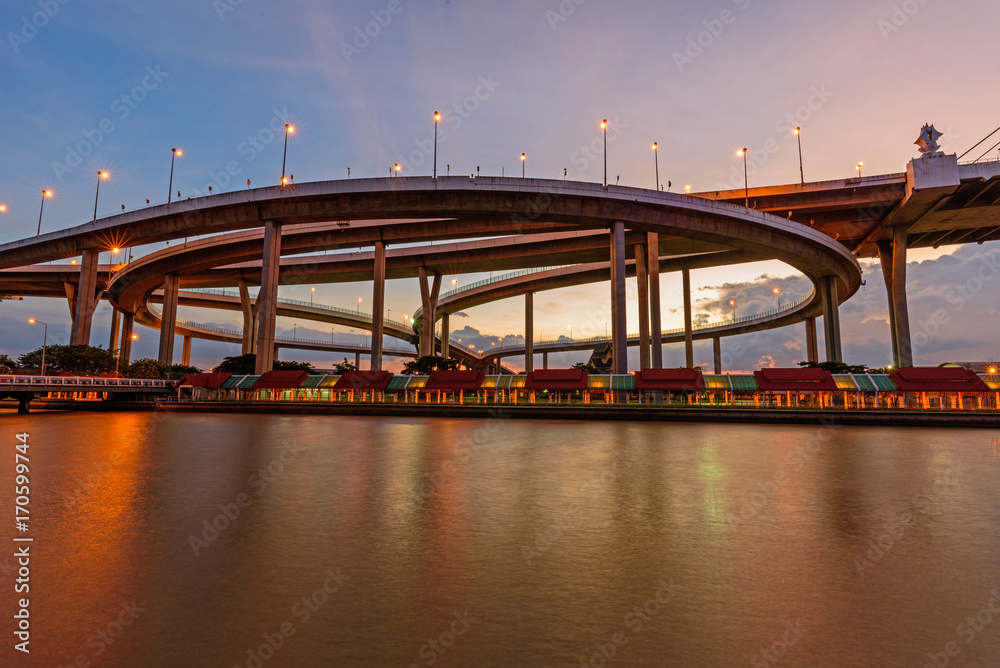 Beautiful Big Bhumibol Bridge in sunset time / Big expressway bridge at the river