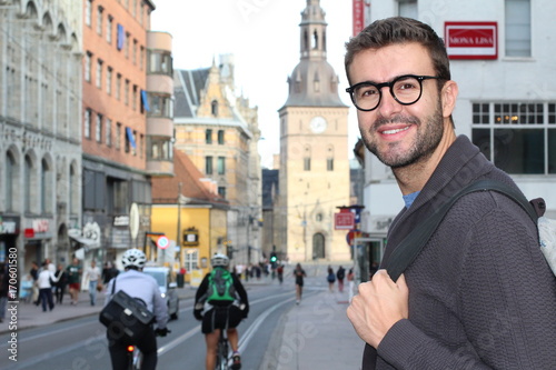Photography Male strolling around the city with his backpack