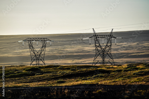High-voltage lines in Iceland against infinite space