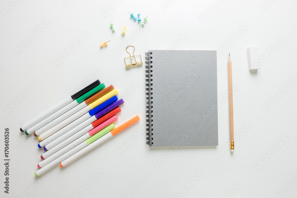 Minimal work space - Creative flat lay photo of workspace desk with sketchbook and wooden pencil on copy space white background. Top view , flat lay photography. Minimal work space - Creative flat lay photo of workspace desk with sketchbook and wooden pencil on copy space white background. Top view , flat lay photography.