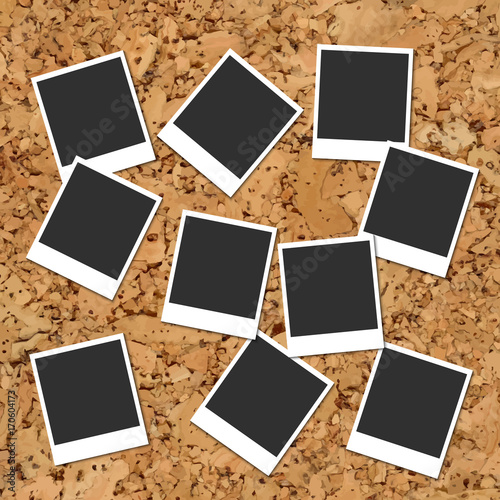 Cork board with scattered photo cards