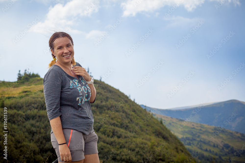 young girl woman hiking in the mountains