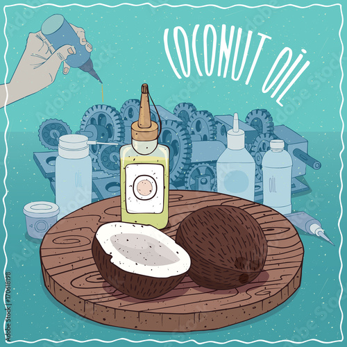 Plastic Oil Can of Coconut oil and Coconuts. Hand lubrication mechanism. Natural vegetable oil used as grease lubricant