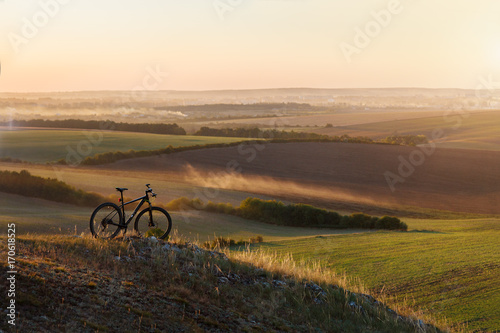 Sunrise, sunset, Cycling around the world Is a journey to freedom.