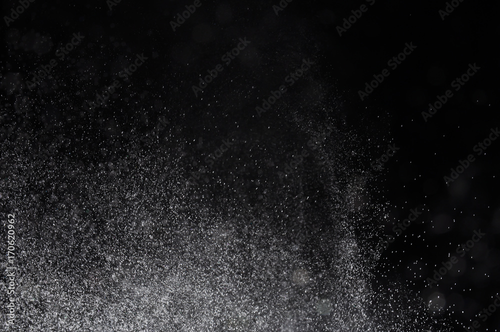 Snowstorm texture,Water dust in motion like snow on black,Watercolor background