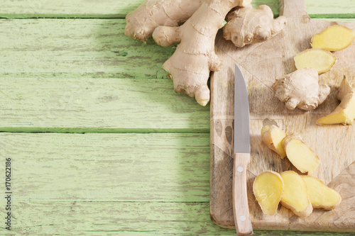 Ginger on wooden background