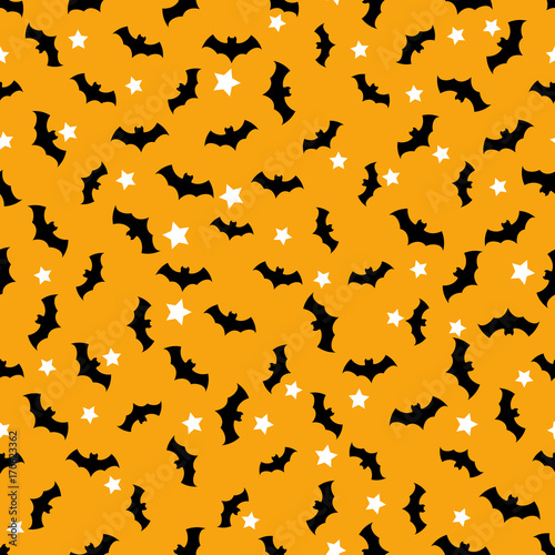 Seamless pattern with bats flying in the orange sky and white stars. Halloween background