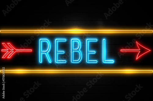 Fototapeta Rebel  - fluorescent Neon Sign on brickwall Front view