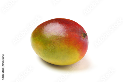 whole mango on white background