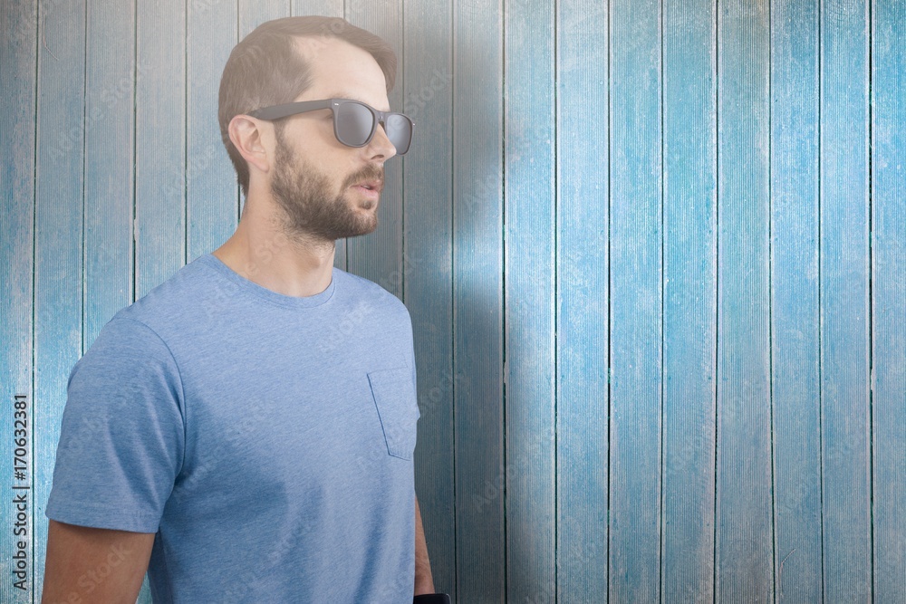 Composite image of male model wearing sunglasses Composite image of male model wearing sunglasses