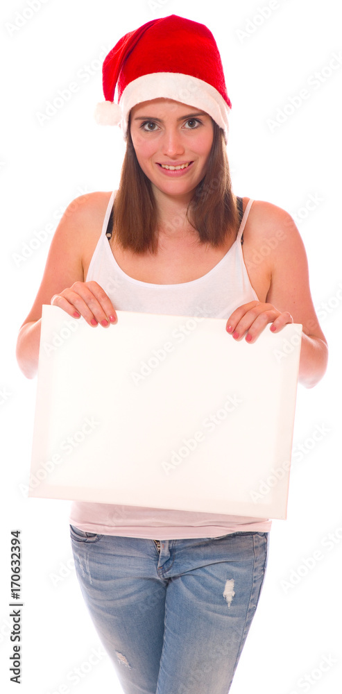 Attraktive Frau mit Nikolausmütze und Schild Attraktive Frau mit Nikolausmütze und Schild