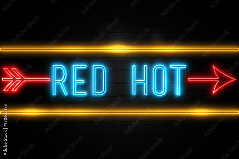 Obraz premium Red Hot - fluorescent Neon Sign on brickwall Front view
