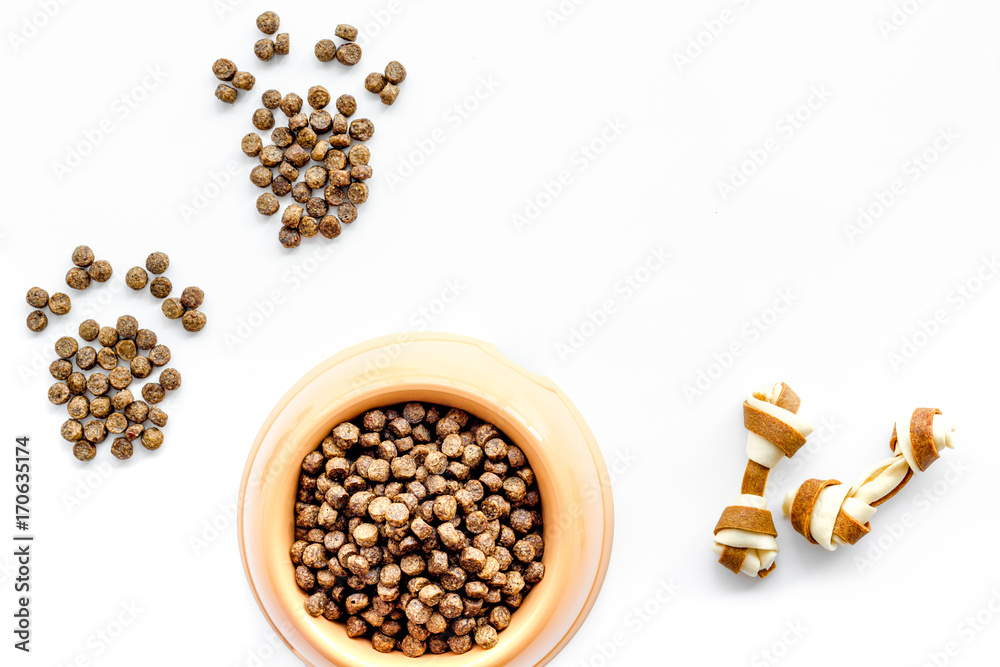 dry pet - dog food in bowl on white background top view mock up dry pet - dog food in bowl on white background top view mock up