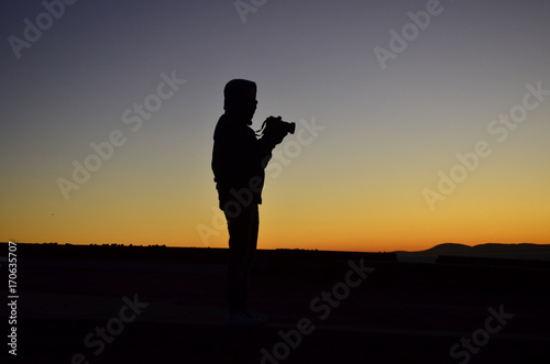 The photographer in the sunset