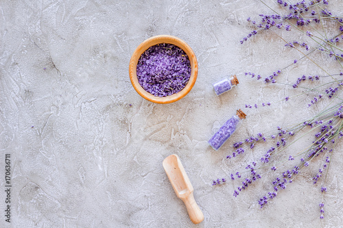natural cosmetics with lavender and herbs for homemade spa on stone background top view mock up