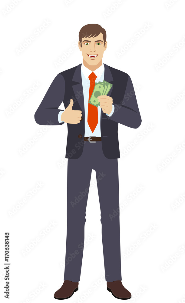 Businessman showing thumb up with cash money Businessman showing thumb up with cash money