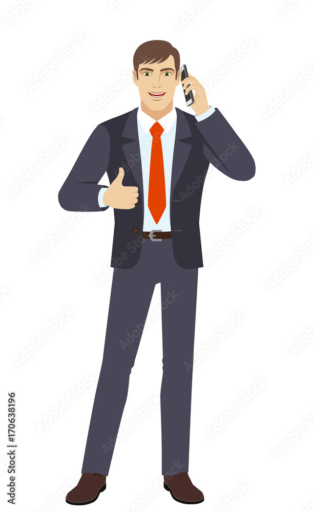 Businessman talking on the mobile phone and showing thumb up Businessman talking on the mobile phone and showing thumb up