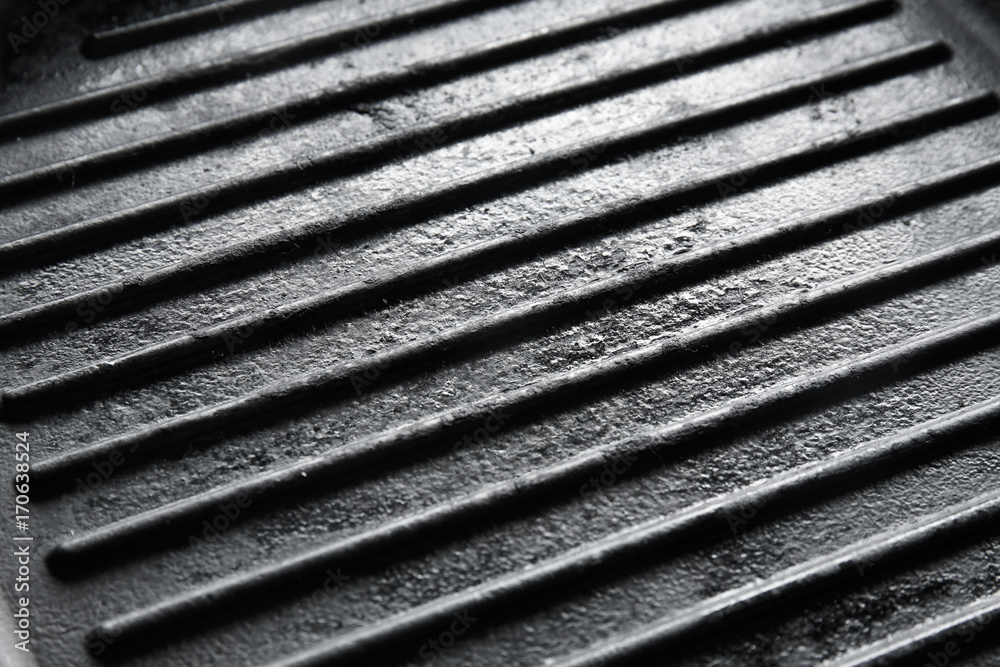 Ribbed cast iron textured surface, closeup Ribbed cast iron textured surface, closeup