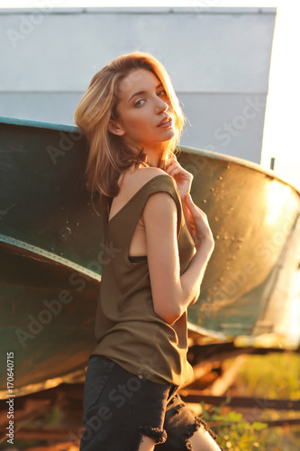 Fashionable young woman nea...