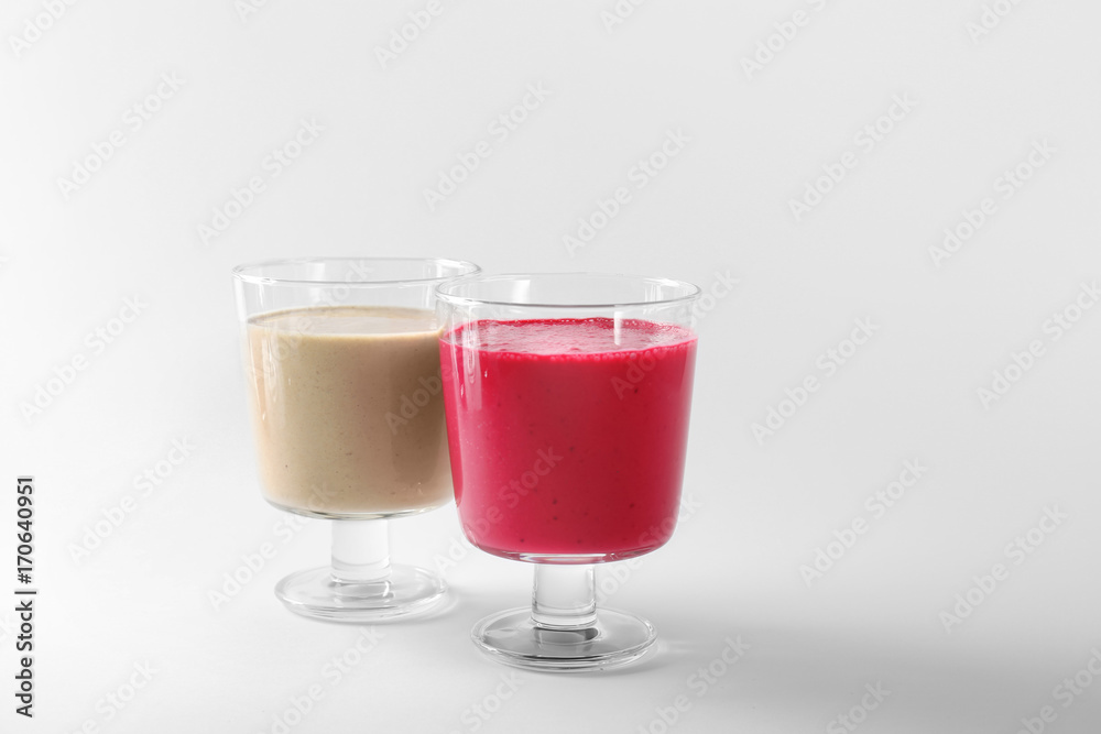 Glasses with different smoothies on white background Glasses with different smoothies on white background
