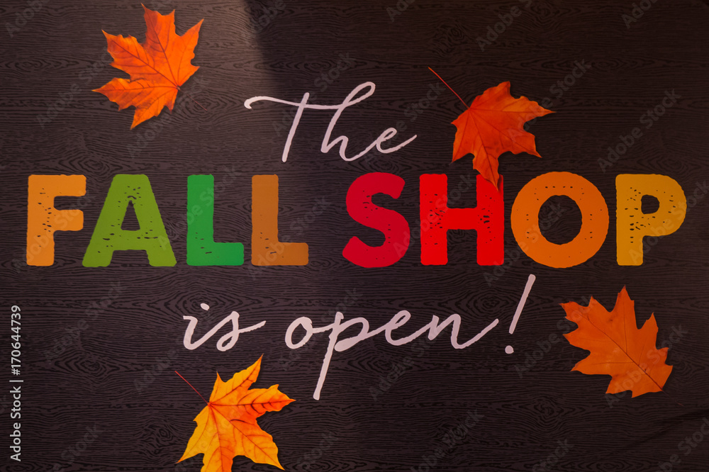 Fototapeta premium A sign that declares that autumn is upon us and open for business.