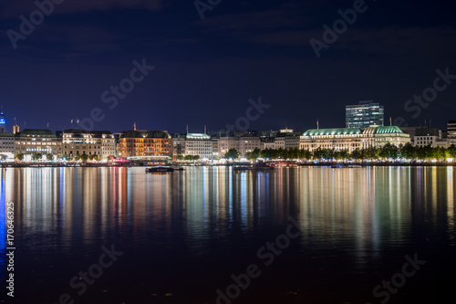 nightly panorama of Hamburg - Inner City with laser beam © gerckens.photo