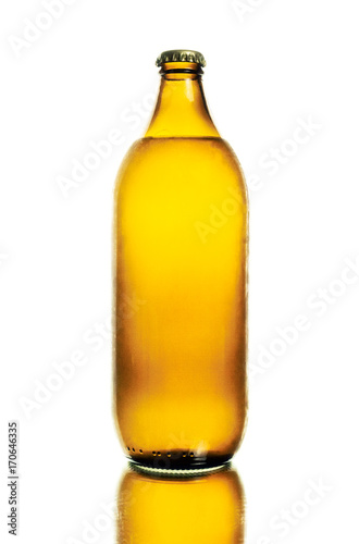 A bottle of beer, isolated on white background, over a mirror.
