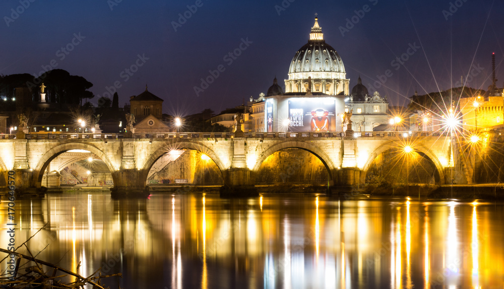 Vatican dome and bridge lights mirroed in water