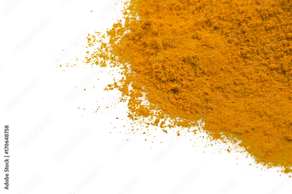 dust of ground turmeric on the white dust of ground turmeric on the white