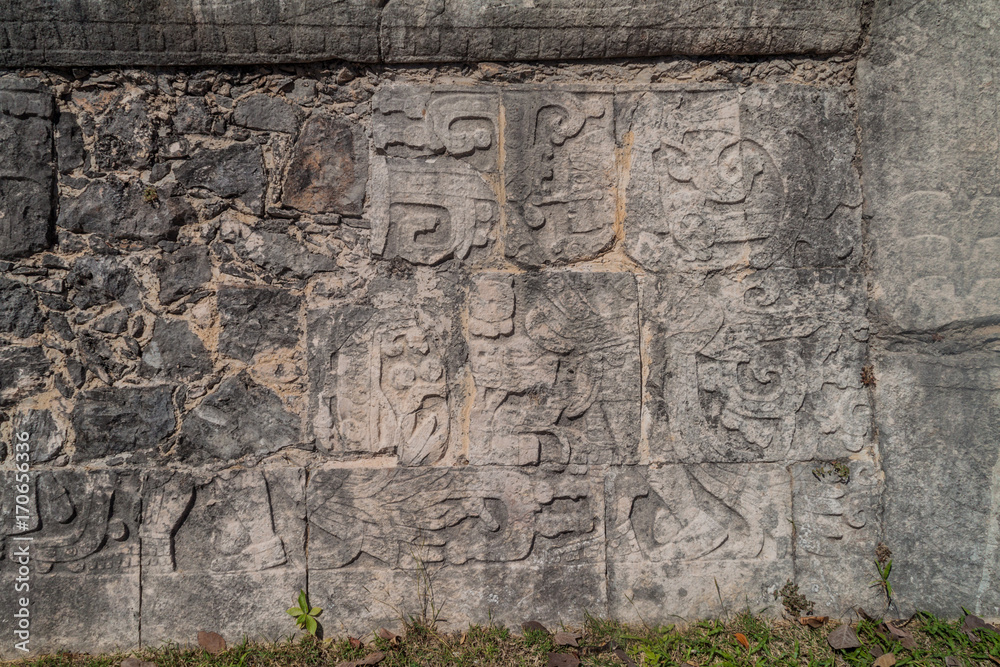 Reliefs of the players at the great ball game court at the archeological site Chichen Itza, Mexico.