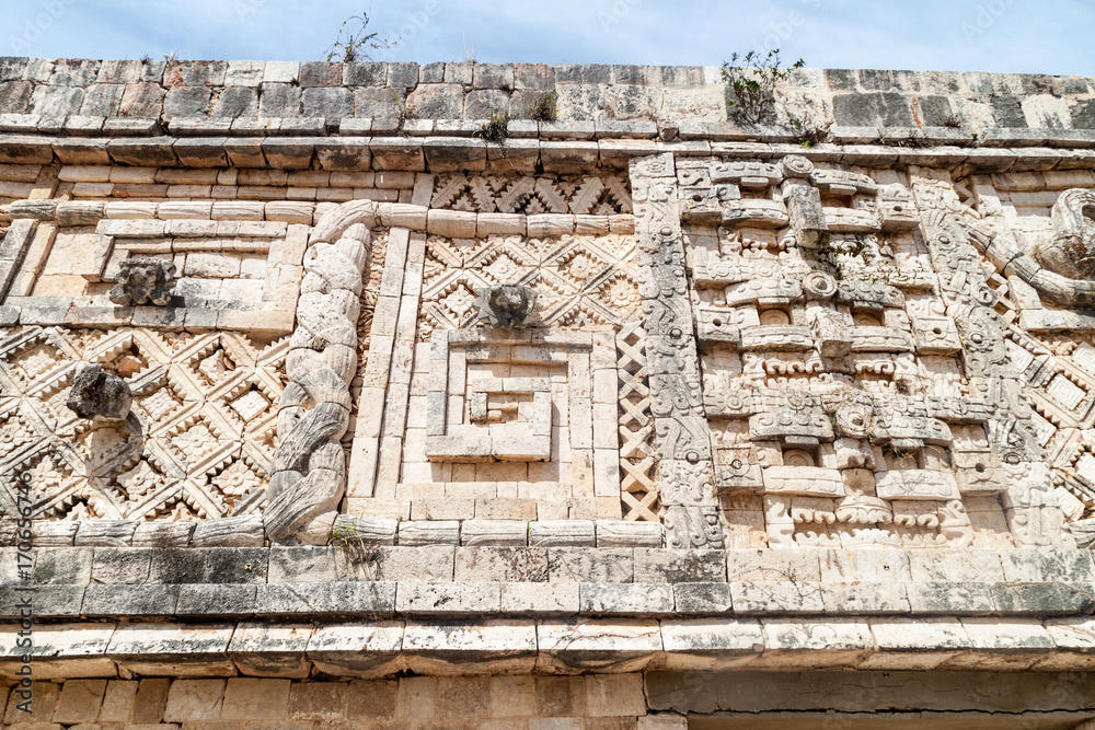 Detailed carvings at the Nun's Quadrangle (Cuadrangulo de las Monjas) building complex at the ruins of the ancient Mayan city Uxmal, Mexico
