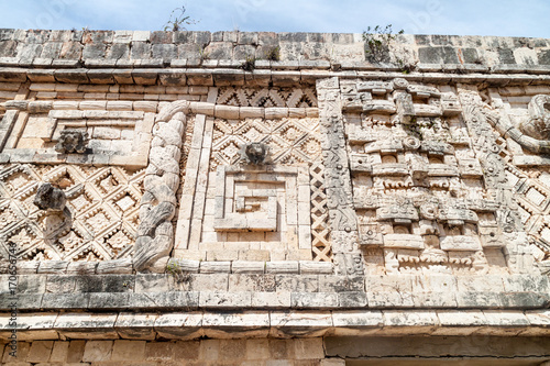Detailed carvings at the Nun's Quadrangle (Cuadrangulo de las Monjas) building complex at the ruins of the ancient Mayan city Uxmal, Mexico