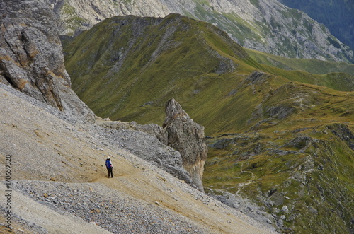 Obraz na płótnie Young woman hiking in the Dolomites w salonie