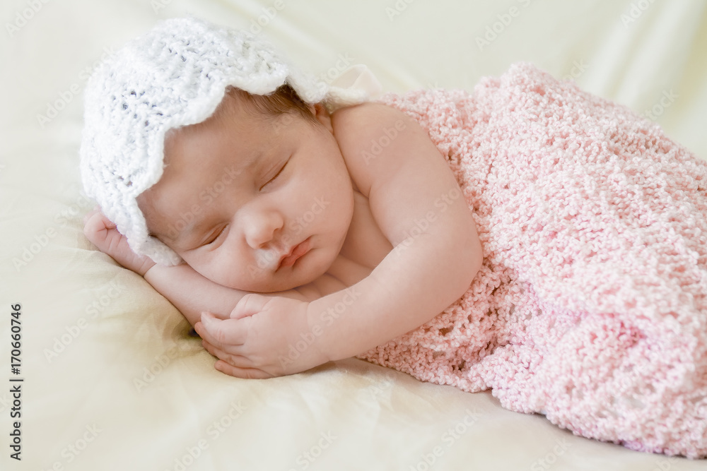 indoor portrait of adorable european newborn baby
