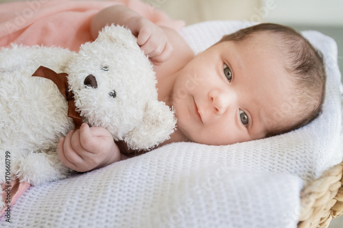 indoor portrait of adorable european newborn baby
