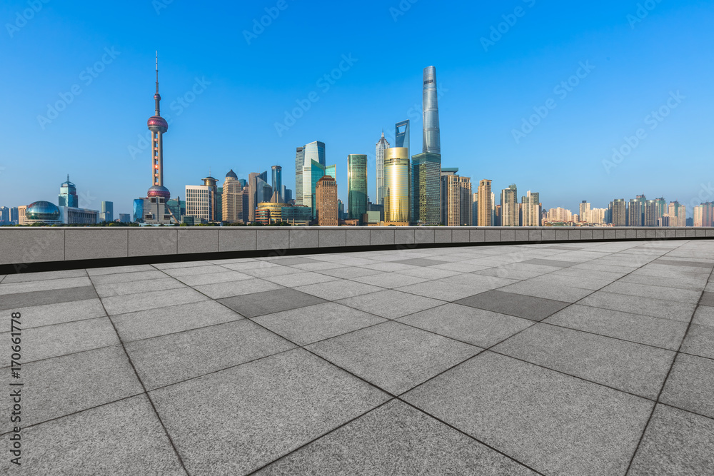 cityscape and skyline of shanghai in blue sky from empty floor.