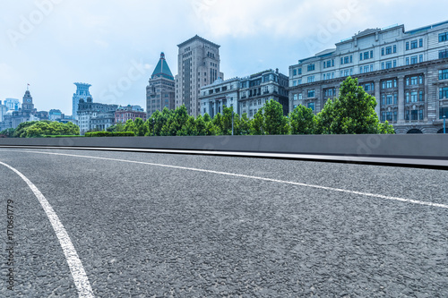 Photography cityscape and skyline of shanghai from empty asphalt road