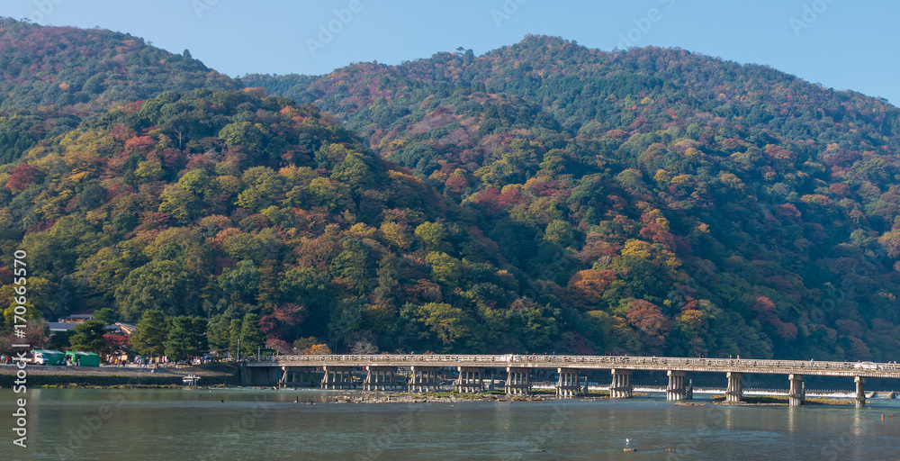 Togetsukyo bridge and Hozu river in autumn season, Kyoto, Japan.